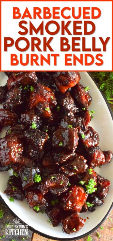 Barbecued Smoked Pork Belly Burnt Ends are prepared with trimmed and cubed pork belly which has been dry rubbed with a sweet spice blend. The pork is smoked with apple wood before being tossed with sauce and returned to the smoker to char up. #porkbelly #smoked #smoker #smokedrecipes #bbq #smokedpork #burntends