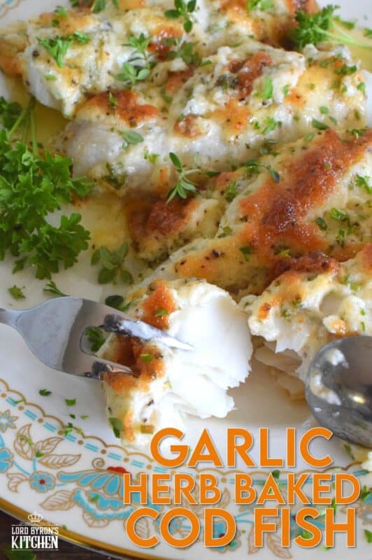 Fresh cod fillets are generously topped with fresh minced garlic and a variety of chopped fresh herbs which is combined with mayonnaise and grated parmesan cheese. The fish is perfectly baked until brown and bubbly. Garlic Herb Baked Cod Fish is both savoury and delicious! #cod #fish #seafood #bakedcod #parmesancod #freshherbs