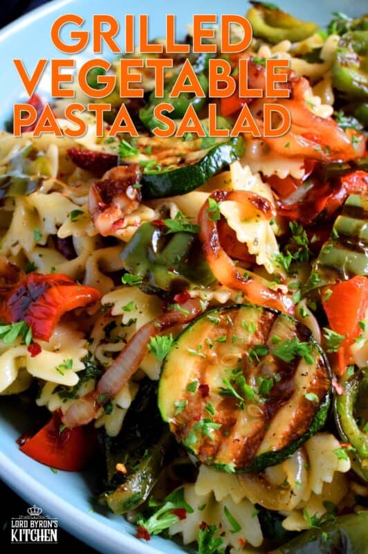 Perfectly charred bell peppers, onions, jalapenos, and zucchini make up this Grilled Vegetable Pasta Salad. Tossed with a simple, easy to make, light, oil-based homemade dressing, this is a perfect summer side! Serve warm or at room temperature! #grilled #vegetable #veggies #pasta #salad #summer #side #picnic #backyard