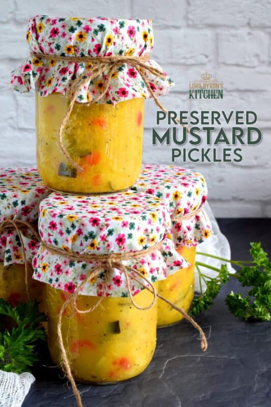Preserved Mustard Pickles are a sweet and tart condiment or side dish made from cauliflower, zucchini, red bell pepper, onion, and carrot. A condiment so delicious, I often eat it as a side dish! #preserved #canning #mustard #pickles #newfoundland #newfie