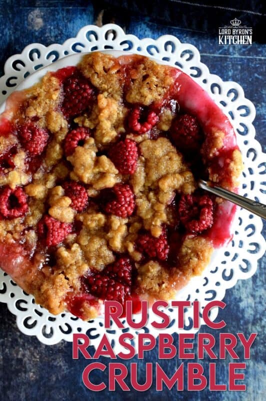 Made from simple ingredients, Rustic Raspberry Crumble is an impressive dessert with very little effort! For added pizzazz, prepare the mixture in individually portioned dessert ramekins; they're much more impressive that way! And, of course, no matter how delicious a crumble might be, it always needs a scoop of good vanilla ice cream! #crumble #rasberries #berries #summerfresh #easydesserts