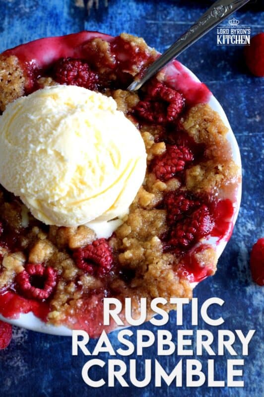 Made from simple ingredients, Rustic Raspberry Crumble is an impressive dessert with very little effort! For added pizzazz, prepare the mixture in individually portioned dessert ramekins; they're much more impressive that way! And, of course, no matter how delicious a crumble might be, it always needs a scoop of good vanilla ice cream! #crumble #rasberries #berries #summerfresh #easydesserts