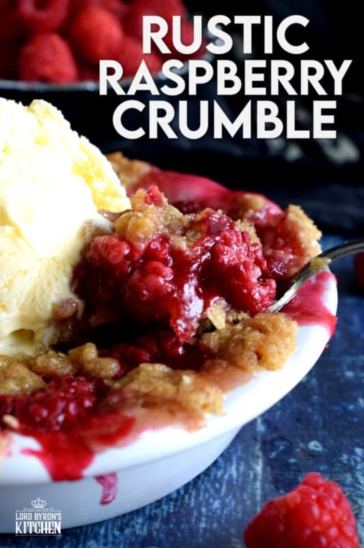 Made from simple ingredients, Rustic Raspberry Crumble is an impressive dessert with very little effort! For added pizzazz, prepare the mixture in individually portioned dessert ramekins; they're much more impressive that way! And, of course, no matter how delicious a crumble might be, it always needs a scoop of good vanilla ice cream! #crumble #rasberries #berries #summerfresh #easydesserts