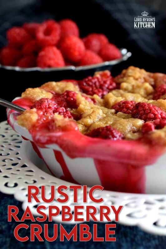 Made from simple ingredients, Rustic Raspberry Crumble is an impressive dessert with very little effort! For added pizzazz, prepare the mixture in individually portioned dessert ramekins; they're much more impressive that way! And, of course, no matter how delicious a crumble might be, it always needs a scoop of good vanilla ice cream! #crumble #rasberries #berries #summerfresh #easydesserts