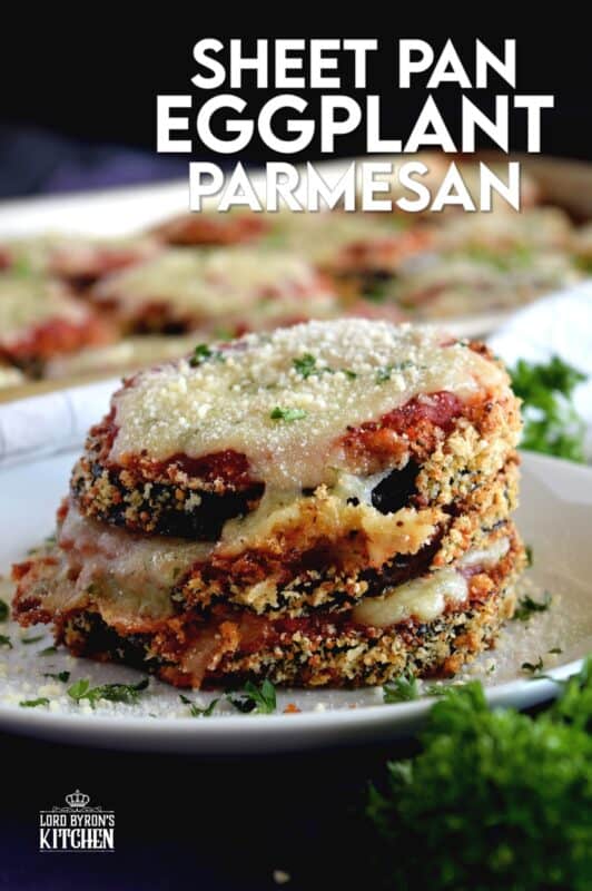 An update on an old Italian classic; this healthier version of Sheet Pan Eggplant Parmesan is bursting with flavour. No need to pan-fry the eggplant first in this version; it's coated in panko crumbs and baked to keep it crispier and lighter! #eggplant #parmesan #eggplantparmesan #italianrecipes #sheetpan #sheetpanrecipes #eggplant #parmesan #eggplantparmesan #italianrecipes #sheetpan #sheetpanrecipes