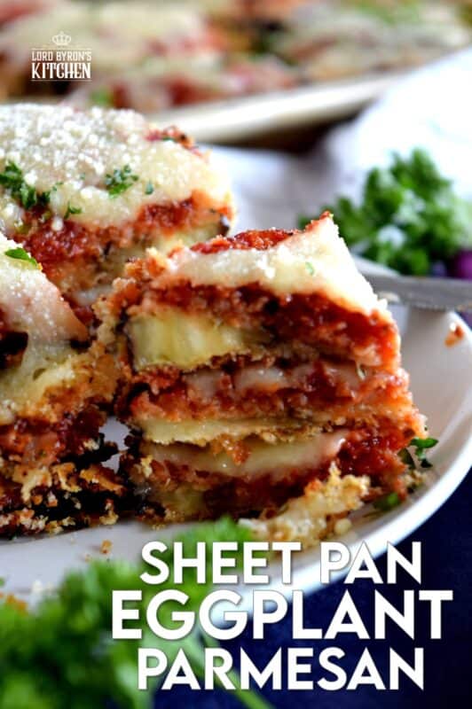 An update on an old Italian classic; this healthier version of Sheet Pan Eggplant Parmesan is bursting with flavour. No need to pan-fry the eggplant first in this version; it's coated in panko crumbs and baked to keep it crispier and lighter! #eggplant #parmesan #eggplantparmesan #italianrecipes #sheetpan #sheetpanrecipes #eggplant #parmesan #eggplantparmesan #italianrecipes #sheetpan #sheetpanrecipes