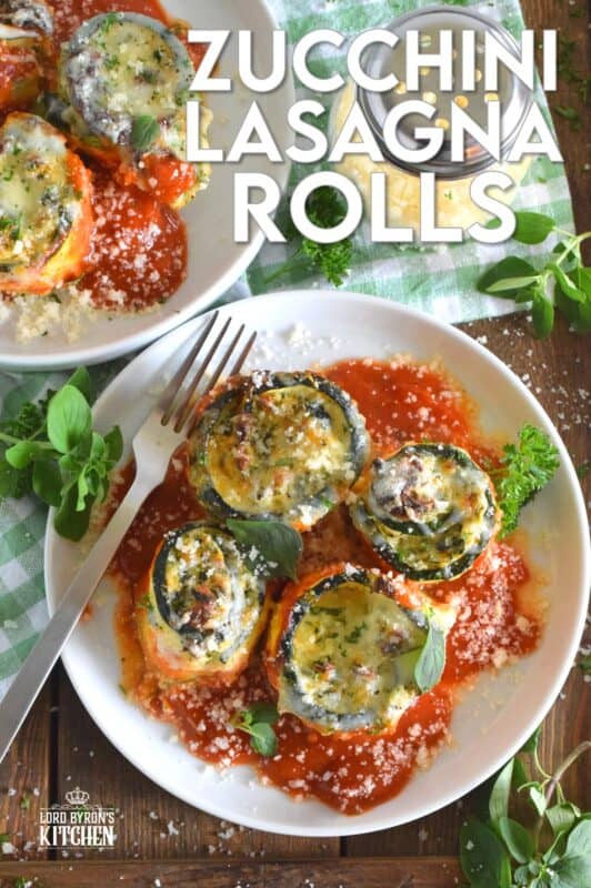A little lighter on the carbs, Zucchini Lasagna Rolls are prepared by rolling thinly sliced zucchini with spinach, egg, three cheeses, and seasonings. Baked in marinara sauce, don't be fooled by this healthier dish; it is both filling and robust! #zucchini #zucchinirolls #lasagna #lasagnarolls #zucchinilasagna #lowcarb