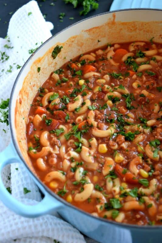 A soup that's a complete meal! Beef and Pasta Tomato Soup covers all the bases in terms of being a well-balanced meal. It's delicious, hearty, mom/dad-approved, and kid-friendly too! #beef #tomato #pasta #soup #heartysoup #familyrecipes