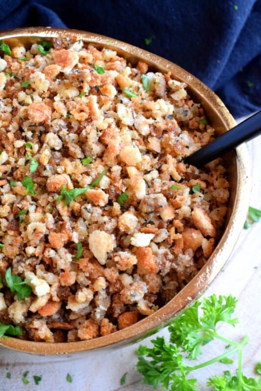 Loved throughout Newfoundland, this traditional baked dressing uses pure savoury to transform a bread stuffing into something extraordinarily tasty! The same preparation method is applied whether you bake or pan-fry the dressing, and even if you stuff it into your turkey! #newfoundland #recipes #stuffing #dressing #traditional