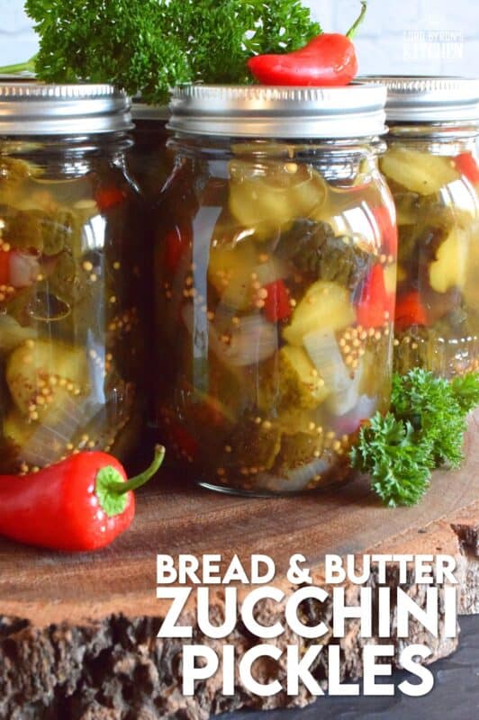 Bread and Butter Zucchini Pickles are one of my favourite condiments. Easy to prepare, and inexpensive too, this is a great recipe to prepare as gifts for friends or to stock your pantry for the winter months ahead. #breadandbutter #zucchini #pickles #preserves #sweet #masonjar