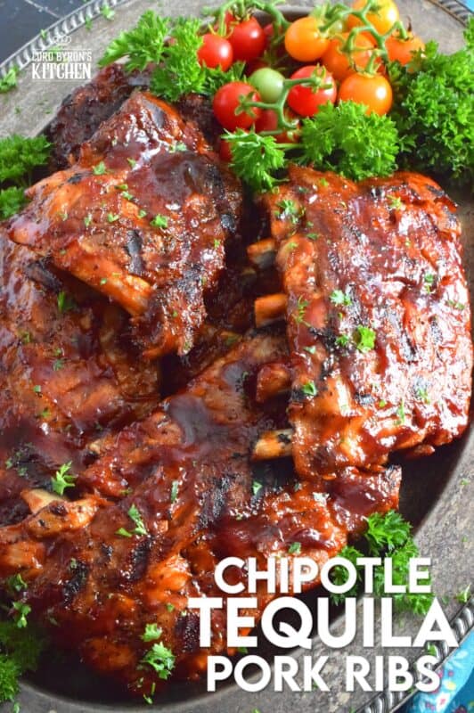Super moist and tender pork ribs are first prepared in an instant pot and then brushed with a homemade chipotle tequila barbecue sauce. The ribs are then tossed on the grill until that delicious sauce becomes hot, sticky, and stuck to those gorgeous ribs by means of beautiful grill marks. Are you drooling yet? #chipotle #tequila #bbq #ribs #porkribs #pork