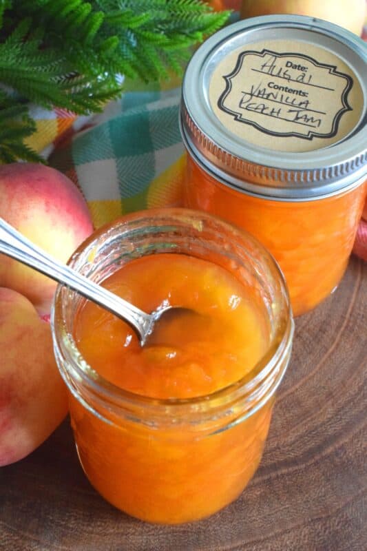 Easy to prepare Small Batch Vanilla Peach Jam is one of my favourite summertime preserves. Prepare this jam when peaches are in season for the best results. All you need are peaches, sugar, and a drop of good vanilla extract. #peach #jam #peaches #smallbatch