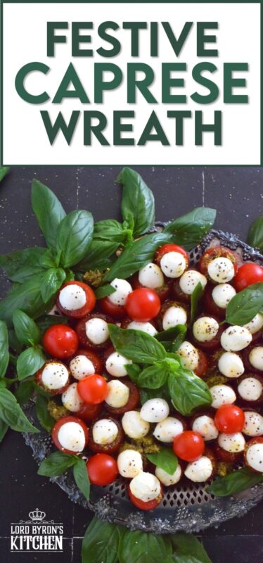 Simple, sweet, and cheesy!? You bet! This gorgeous Festive Caprese Wreath is easily prepared with hollowed-out cherry tomatoes stuffed with basil pesto and mini bocconcini. Sprinkle over some freshly ground black pepper, drizzle with olive oil, and tuck in some fresh basil leaves before serving! #festive #caprese #ediblewreath #tomatoes #bocconcini