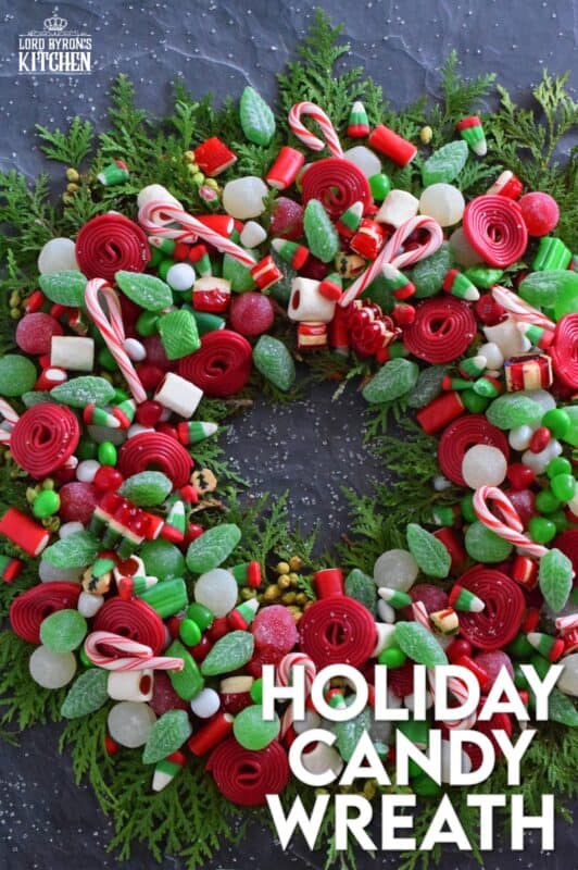 Prepare a Holiday Candy Wreath this Christmas and impress both the young and old kids in your home! Using as many red, green, and white candies as you can source, this bright and festive edible wreath is packed full of sweets! Set this up in the middle of your dessert buffet table, right on your kitchen island, or in the middle of your coffee table! Not only is it tasty, it also doubles as a decorative centerpiece! #wreath #candy #christmas #holiday #fingerfoods #party