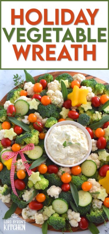 Every party needs a platter or two of finger foods for everyone to munch on. No matter what type of party you're hosting, it most certainly needs a Holiday Vegetable Wreath platter. This gorgeous wreath is prepared using fresh broccoli, cauliflower, tomatoes, cucumbers, and more! Serve with your favourite vegetable dip! #christmas #holiday #partyfood #appetizers #veggieplatter #veggies