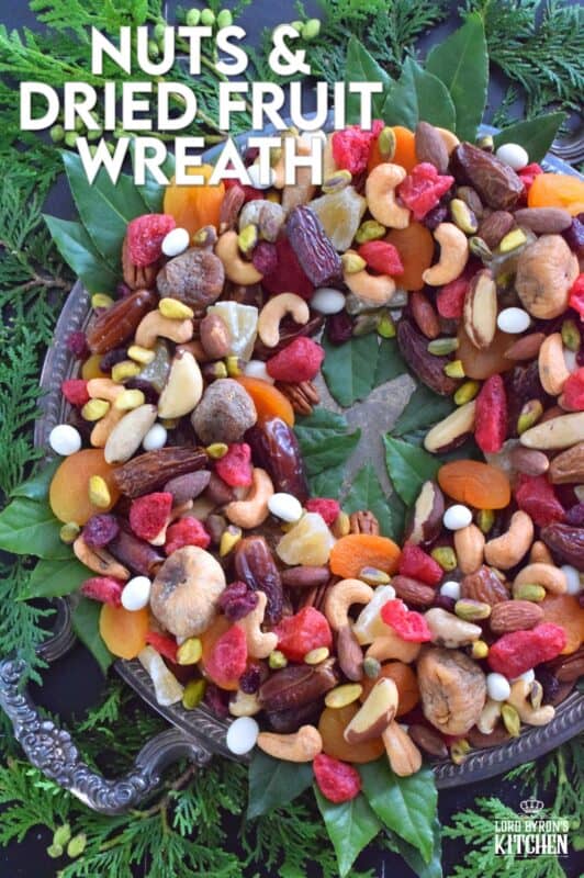 Christmastime is synonymous with nuts and fruits, so with that in mind, a Nuts and Dried Fruit Wreath was an obvious choice! No cooking or baking is necessary here! Assemble this beautiful, healthy snack wreath in very little time with a quick trip to your favourite bulk food supply store! #driedfruit #nuts #snacks #christmas #partyfoods #snackbowl