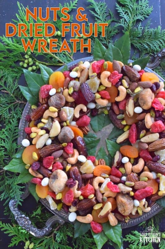 Christmastime is synonymous with nuts and fruits, so with that in mind, a Nuts and Dried Fruit Wreath was an obvious choice! No cooking or baking is necessary here! Assemble this beautiful, healthy snack wreath in very little time with a quick trip to your favourite bulk food supply store! #driedfruit #nuts #snacks #christmas #partyfoods #snackbowl