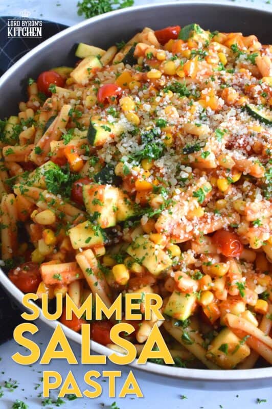 Prepared with fresh tomatoes, corn, and zucchini, Summer Salsa Pasta comes together in less than 25 minutes. With a bright, fresh, flavour, this pasta dish relies heavily on some of the best that summer has to offer. Top with parmesan cheese and grab a fork; dinner is ready! #salsa #summersalsa #pasta #summerpasta #zucchini #corn #tomatoes #meatless