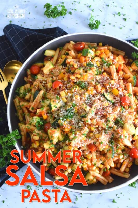 Prepared with fresh tomatoes, corn, and zucchini, Summer Salsa Pasta comes together in less than 25 minutes. With a bright, fresh, flavour, this pasta dish relies heavily on some of the best that summer has to offer. Top with parmesan cheese and grab a fork; dinner is ready! #salsa #summersalsa #pasta #summerpasta #zucchini #corn #tomatoes #meatless