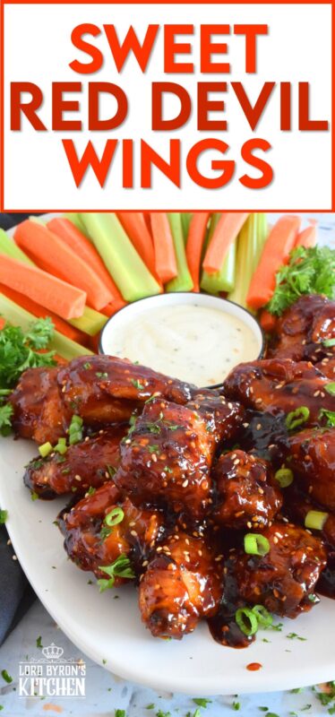 In this recipe, chicken wings are baked until golden brown and crispy and then they're tossed in a hot and spicy homemade sauce which is prepared in just a few minutes. Sweet Red Devil Wings are perfectly cooked and drenched in a thick, sticky sauce that I just can't get enough of! #sweetandsticky #wings #chicken #sauce