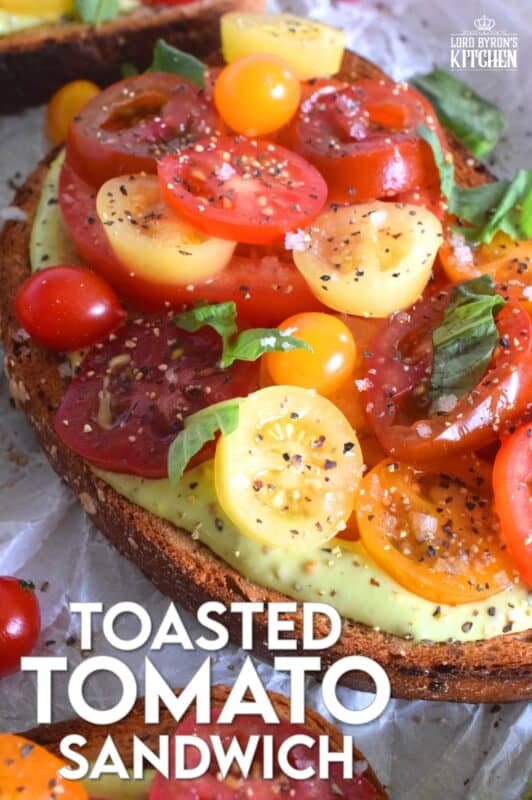 There is nothing in the world as delicious as a Toasted Tomato Sandwich prepared with locally grown, in-season, fresh tomatoes. It's a classic, and one that many of us can remember from the summers of our childhood. This version is simple and easy, but with a few surprise ingredients to increase the yum factor. #toasted #tomato #sandwich #tomatoes #summerfresh #local #sandwiches #classic