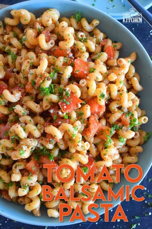 Tomato Balsamic Pasta is prepared with chopped fresh tomatoes and garlic, lots of grated parmesan cheese, and perfectly cooked pasta. With an olive oil and balsamic base, this pasta is super easy, delightfully fresh, and tastes like summer in a bowl! #summerfresh #tomatoes #vegetarian #pasta #oilandbalsamic #freshtomatoes
