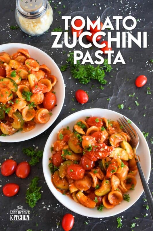 Two of the most common home-grown summer produce are tomatoes and zucchini. Harvest to your hearts' content and prepare copious amounts of this Tomato Zucchini Pasta. It's simple, it's healthy, and it's wonderfully delicious! Just one taste, and this will be a 30-minute recipe you will want to prepare repeatedly! #pasta #tomatoes #zucchini #meatlessmonday #vegetarian #summer #cherry #fresh #orecchiette #familyrecipes
