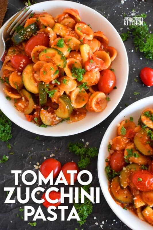 Two of the most common home-grown summer produce are tomatoes and zucchini. Harvest to your hearts' content and prepare copious amounts of this Tomato Zucchini Pasta. It's simple, it's healthy, and it's wonderfully delicious! Just one taste, and this will be a 30-minute recipe you will want to prepare repeatedly! #pasta #tomatoes #zucchini #meatlessmonday #vegetarian #summer #cherry #fresh #orecchiette #familyrecipes