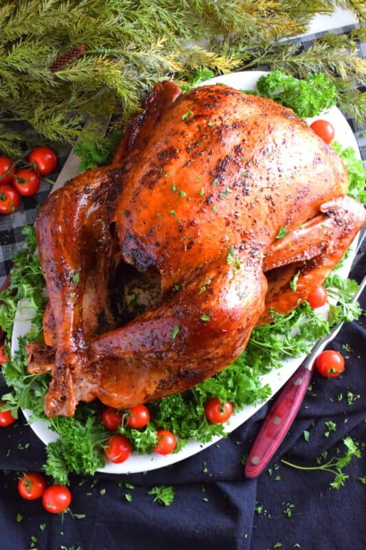 Roasting a whole turkey does not need to be complicated. For a super moist and delicious turkey, you only need 5 ingredients and a little patience. The secret to keeping a turkey from drying out in the oven is butter, and it's so easy! #turkey #roasted #basic #whole #how