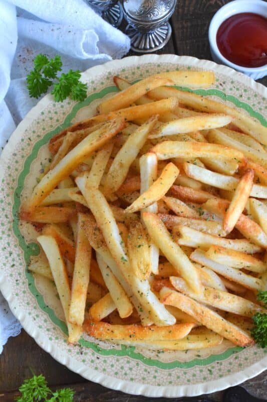 French fries seem to be the side of choice in most fast-food joints, steakhouses, and even some family-style restaurants. In our home, we don't eat them often, but they're a must when making burgers. But, have you ever prepared them as a main? My recipe for The Best French Fry Seasoning will have you thinking that fries are so much more than a side! #fry #frenchfries #fries #seasoning