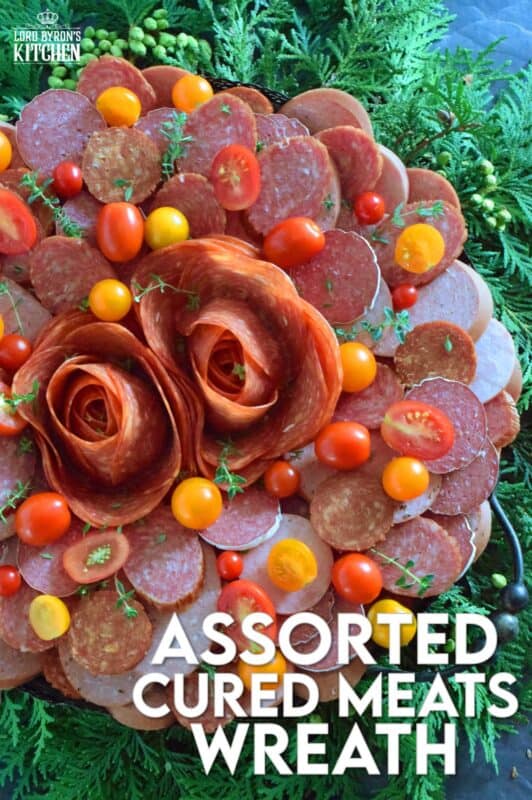 Every festive gathering needs to have a platter of deli-style meats to accompany the crackers, bread, pickles, and cheeses. This impressive Assorted Cured Meats Wreath is just what you need for your holiday buffet table. Prepared with pepperoni, salami, kielbasa, and more, this wreath is for all of the carnivores in your life! #wreath #christmas #holiday #charcuterie