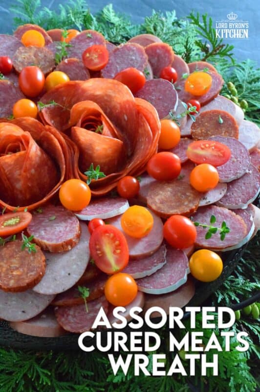 Every festive gathering needs to have a platter of deli-style meats to accompany the crackers, bread, pickles, and cheeses. This impressive Assorted Cured Meats Wreath is just what you need for your holiday buffet table. Prepared with pepperoni, salami, kielbasa, and more, this wreath is for all of the carnivores in your life! #wreath #christmas #holiday #charcuterie