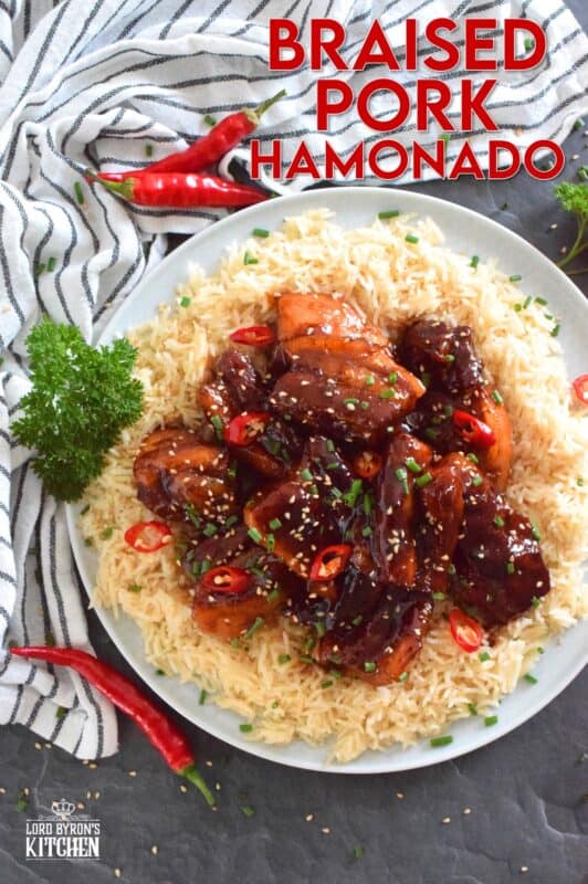Prepared in a braising liquid consisting of brown sugar, pineapple juice, dried chilies, and soy sauce, Filipino-inspired Braised Pork Hamonado is the most satisfying and tasty pork dish. It is sweet, savoury, salty, and spicy, which is everything one could ever want in a pork belly recipe! #porkbelly #hamonado #asian #filipino #pork #braised