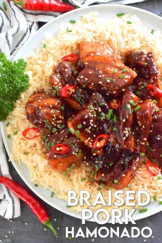 Prepared in a braising liquid consisting of brown sugar, pineapple juice, dried chilies, and soy sauce, Filipino-inspired Braised Pork Hamonado is the most satisfying and tasty pork dish. It is sweet, savoury, salty, and spicy, which is everything one could ever want in a pork belly recipe! #porkbelly #hamonado #asian #filipino #pork #braised