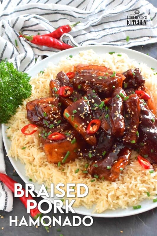 Prepared in a braising liquid consisting of brown sugar, pineapple juice, dried chilies, and soy sauce, Filipino-inspired Braised Pork Hamonado is the most satisfying and tasty pork dish. It is sweet, savoury, salty, and spicy, which is everything one could ever want in a pork belly recipe! #porkbelly #hamonado #asian #filipino #pork #braised