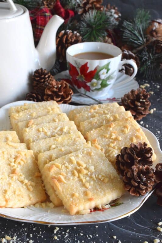 The saying goes that simple is best, and in the case of these Finnish Christmas Biscuits, no saying could ring more true! These light and airy biscuits are buttery and lightly sweetened. The chopped almonds on top add flavour, colour, and texture, which makes these biscuits irresistible, so maybe make a double batch! #cookies #biscuits #christmas #finnish #finland