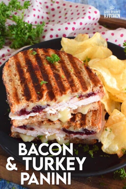 Stuffed to the max with sliced turkey, crispy bacon, and cranberry sauce, this Bacon and Turkey Panini is very moist and juicy. Oh, and it's also loaded with melted, gooey cheese! This sandwich is the best way to use up your Thanksgiving leftovers! If you don't have a panini press, don't worry; I have a solution! #sandwich #panini #grilledsandwich #paninipress #leftovers #turkey #bacon