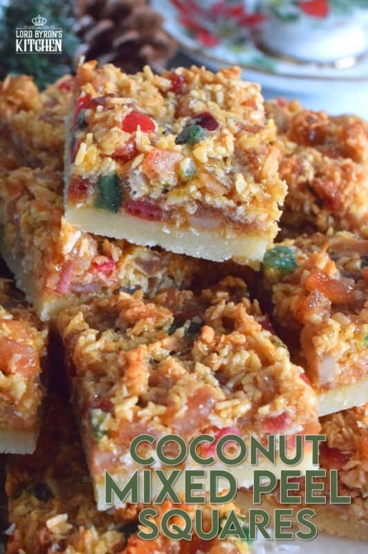 A quick and easy sweet treat which can be made almost entirely with items you already have in your pantry. Coconut Mixed Peel Squares have a simple shortbread-like base, and are topped with a sweet, chewy topping consisting of an Old English fruit cake mix. These squares are where fruitcake and shortbread marry to create the most delicious confection! #coconut #mixedpeel #fruitcake #christmas #holiday #baking