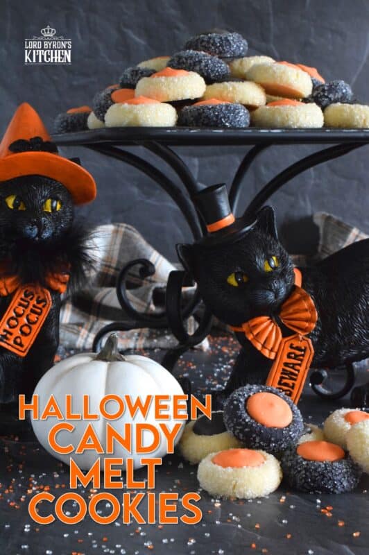 Similar to a classic thumbprint cookie, these Halloween Candy Melt Cookies use candy melts instead of jam. The cookie dough is tinted with food colouring and rolled in sanding sugar, these are all treat and no trick! #halloween #trickortreat #halloweencookies #candymelts #thumbprint