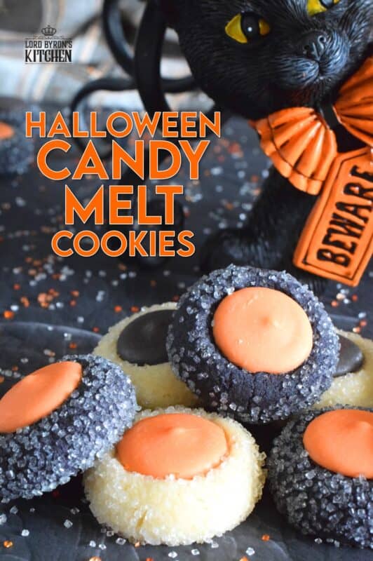Similar to a classic thumbprint cookie, these Halloween Candy Melt Cookies use candy melts instead of jam. The cookie dough is tinted with food colouring and rolled in sanding sugar, these are all treat and no trick! #halloween #trickortreat #halloweencookies #candymelts #thumbprint