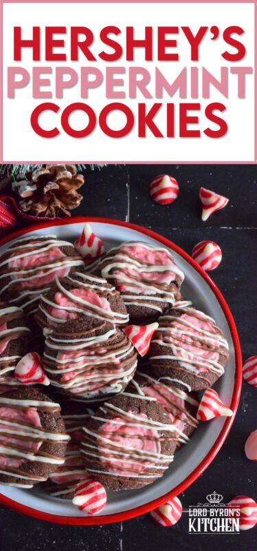 These soft chocolaty Hershey's Peppermint Cookies are baked and then topped with a peppermint kiss as soon as they come out of the oven. Once softened, the kiss is swirled to cover the top of the cookie and then drizzled with melted white chocolate. #peppermint #hershey #kisses #cookies #christmas