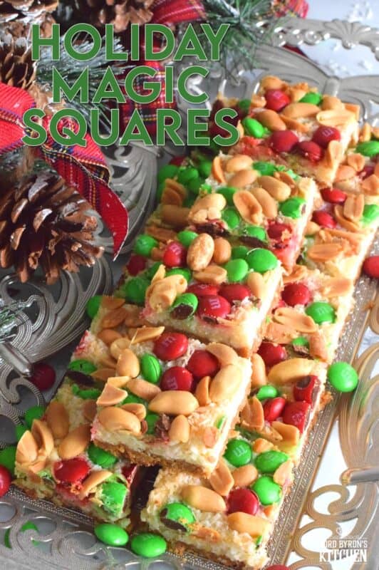 This multi-layered sweet treat is perfect for the holidays! Not only is it fast and easy, but it's also relatively inexpensive too! Prepared with white chocolate, salted peanuts, coconut, and M&Ms, these Holiday Magic Squares are gooey and messy, and absolutely worth it! #holiday #M&M #magicbars #squares #eaglebrand