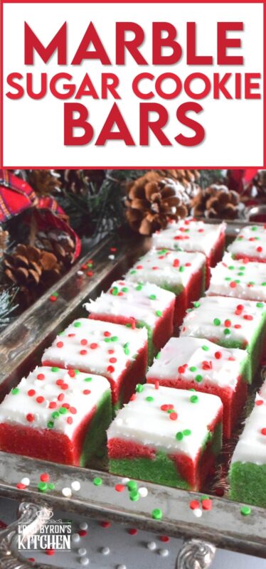 These pillow-soft, beautifully festive red and green Marble Sugar Cookie Bars are going to be on everyone's wishlist this Christmas! The cookie base is buttery and sweet with a light fruity note and topped with a homemade buttercream frosting. One should not question if they will make these; only question whether you will call them bars, squares, cookies, or even cake! #sugarcookies #bars #squares #christmas #holiday #baking #marble #redandgreen