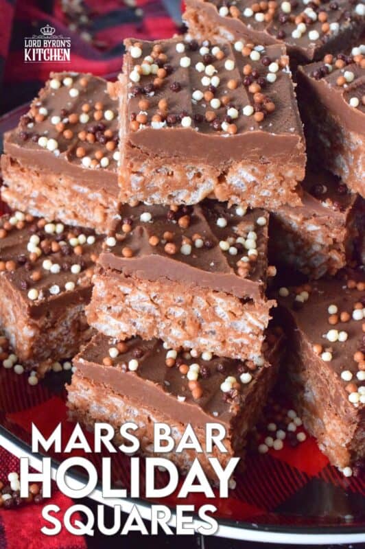 Melted Mars Bars, which consist of caramel, chocolate, and nougat are combined with butter, and rice krispies cereal in these Mars Bar Holiday Squares. Topped with melted milk chocolate and sprinkles, these squares are a no-bake confection that everyone just cannot get enough of! #christmas #holiday #nobake #marsbar #milkyway