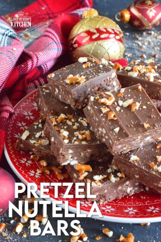 Nutella is very popular in most families, especially families with kids. Pretzel Nutella Bars combines the nutty and creamy chocolatey-ness that is Nutella with the crunchiness and saltiness of pretzels. And, if that wasn't enough, the bars are topped with melted Mirage Candy Bars! #nutella #candybar #chocolate #bars #nobake