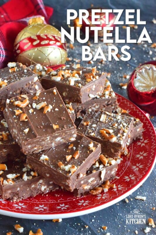 Nutella is very popular in most families, especially families with kids. Pretzel Nutella Bars combines the nutty and creamy chocolatey-ness that is Nutella with the crunchiness and saltiness of pretzels. And, if that wasn't enough, the bars are topped with melted Mirage Candy Bars! #nutella #candybar #chocolate #bars #nobake