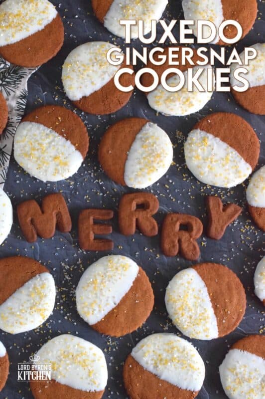 Thin and crispy Tuxedo Gingersnap Cookies are loaded with traditional Christmastime ingredients, like molasses, cinnamon, and ginger! Once cooled, half of each cookie is dipped into melted white chocolate and sprinkled with edible glitter. These cookies taste even better than they look; and I think they look amazing! #tuxedo #gingersnap #cookies #christmas #holiday #baking