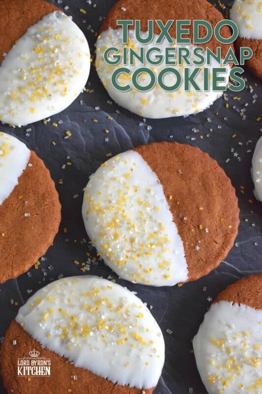 Thin and crispy Tuxedo Gingersnap Cookies are loaded with traditional Christmastime ingredients, like molasses, cinnamon, and ginger! Once cooled, half of each cookie is dipped into melted white chocolate and sprinkled with edible glitter. These cookies taste even better than they look; and I think they look amazing! #tuxedo #gingersnap #cookies #christmas #holiday #baking