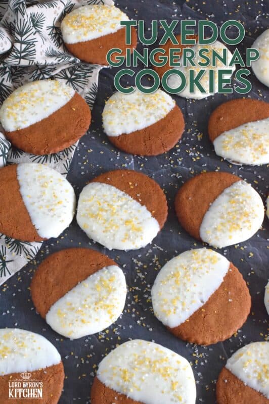 Thin and crispy Tuxedo Gingersnap Cookies are loaded with traditional Christmastime ingredients, like molasses, cinnamon, and ginger! Once cooled, half of each cookie is dipped into melted white chocolate and sprinkled with edible glitter. These cookies taste even better than they look; and I think they look amazing! #tuxedo #gingersnap #cookies #christmas #holiday #baking