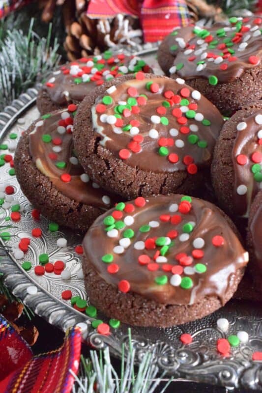 Not a Christmas passes by in our home without a packet or two of our favourite chocolates. This year, I added them to my holiday cookie recipes in these Sugared Andes Mint Cookies. These cookies are both minty and chocolatey, which is a perfect sweet treat combination. In this case, I'm not sure if it's the cookie that elevates the Andes Mint or the other way round! You can be the judge of that! #andes #andesmints #chocolate #christmas #cookies #holiday #baking